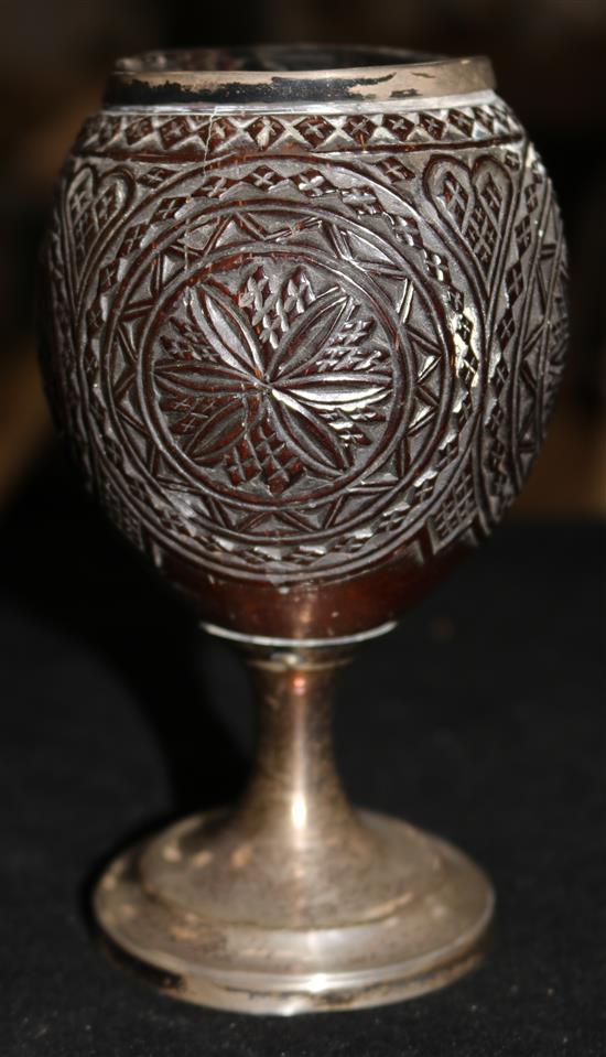 A George III silver mounted coconut cup and cover, maker ?F over TS, London, 1811, 6.25in.